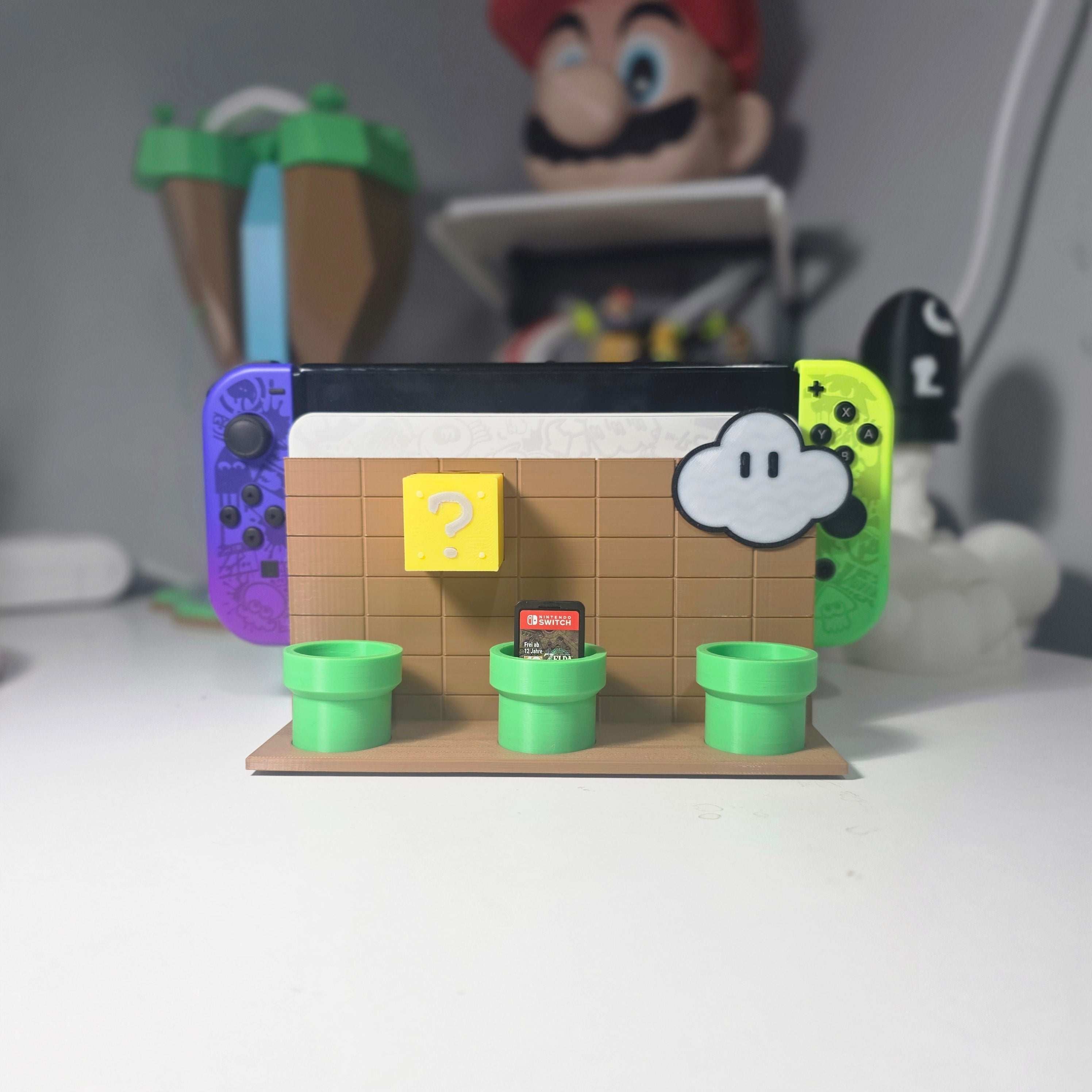 Close-up of a Super Mario-themed Nintendo Switch dock with vibrant red and blue colors, showcasing its compact design and game storage slots.