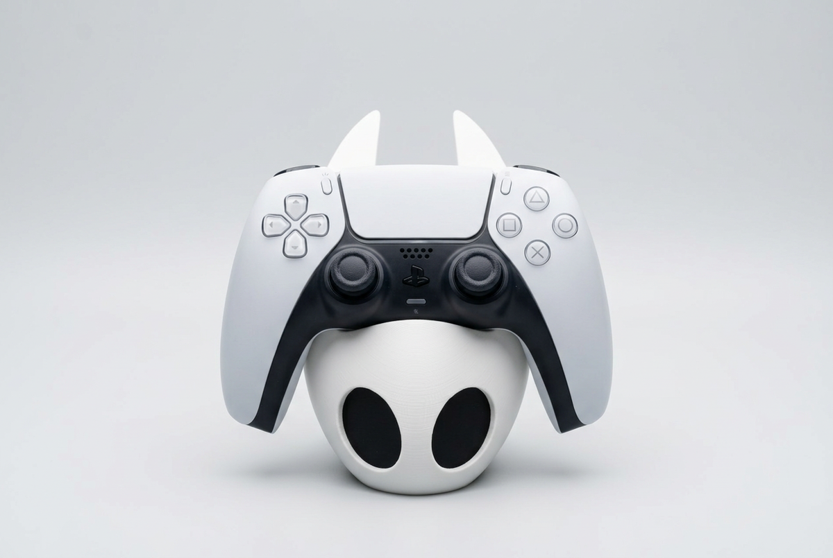 Hornet mask-shaped controller holder with DualSense, front studio visualization