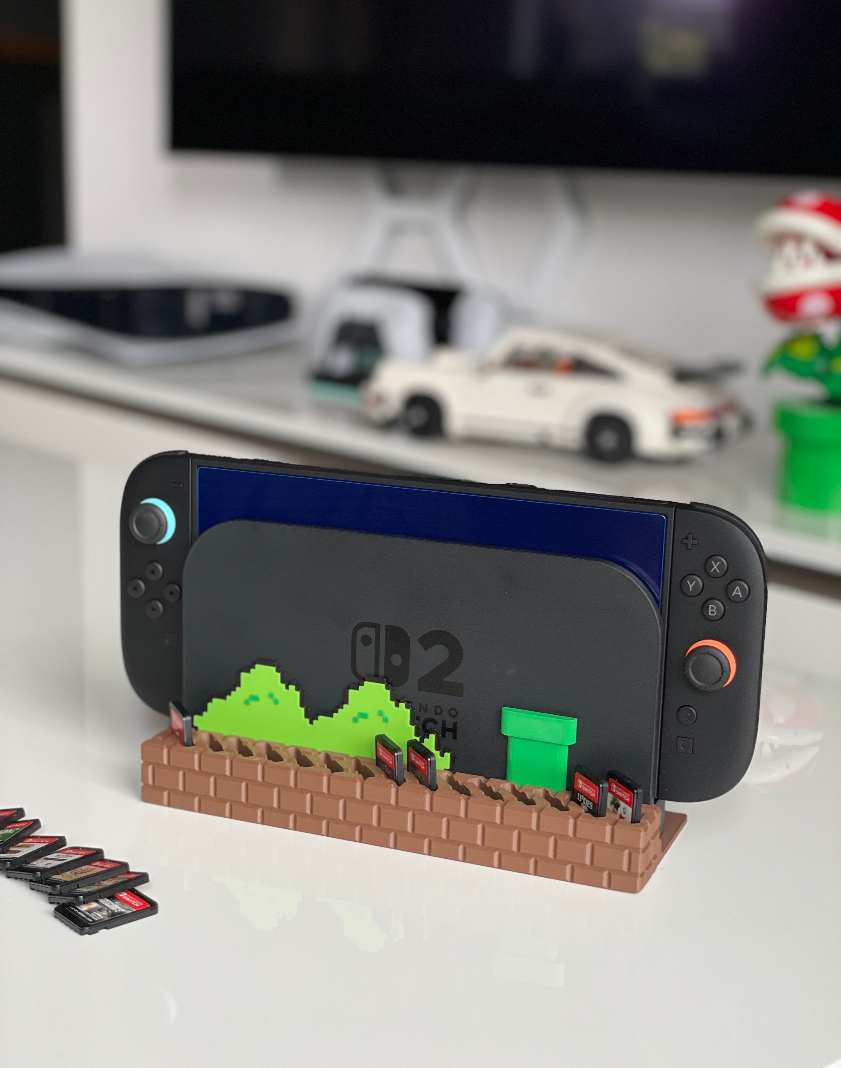 Nintendo Switch 2 cartridges organized inside Mario-style brick holder