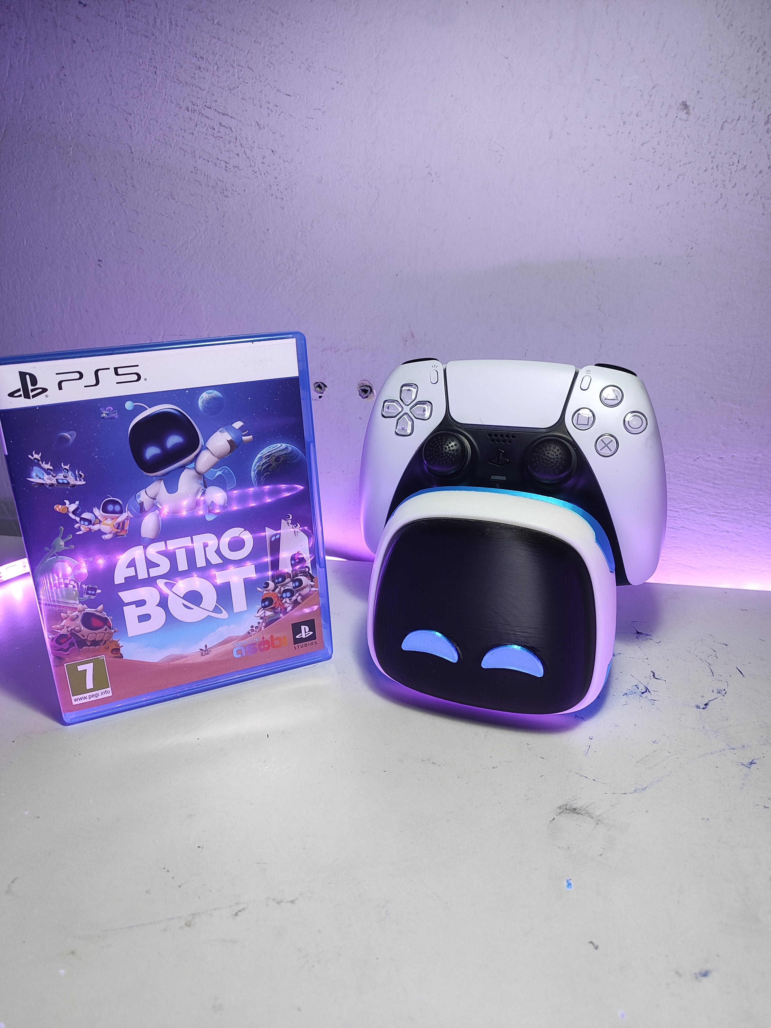 Astro Bot themed controller holder for PlayStation 5 setup