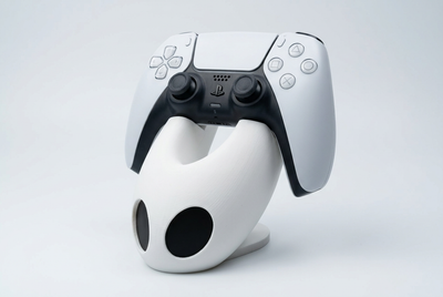 Angled view of Hornet controller holder with DualSense, studio visualization
