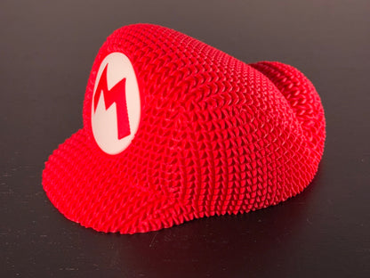 Knitted Super Mario Hat Decor – Mario Cap Gaming Room Decoration – Retro Gamer Gift – Nintendo Inspired Display Piece
